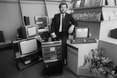 British businessman Alan Sugar, the founder of consumer electronics company Amstrad, surrounded by Amstrad products, 12th February 1985. (Photo by Monty Fresco/Express/Hulton Archive/Getty Images)