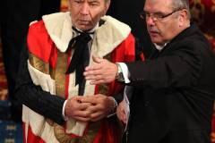 LONDON, ENGLAND - NOVEMBER 18:  Newly appointed Lord, Sir Alan Sugar, makes his way into the Lords chamber for the Queens speech at the annual State Opening Of Parliament on November 18, 2009 in London, England. Queen Elizabeth II unveiled the Government's legislative programme in a speech delivered from the Throne in The House of Lords. This new session of Parliament will only last until the general election which has to be called by June 3, 2010. (Photo by Richard Pohle/WPA Pool/Getty Images)