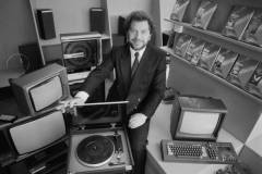British businessman Alan Sugar, the founder of consumer electronics company Amstrad, surrounded by Amstrad products, 12th February 1985. (Photo by Monty Fresco/Express/Hulton Archive/Getty Images)